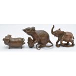 Three Japanese bronzes, an elephant, pig and mouse eating sweetcorn, largest 5 x 5cm