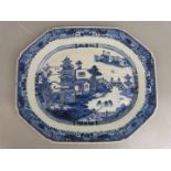 A 19thC Chinese porcelain octagonal charger decorated with pergola, bridge and figures, 38 x 45cm