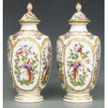 A pair of 19thC covered pedestal vases decorated with Birds of Paradise in the Chelsea style, gold