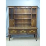 Georgian style oak dresser with crossbanded decoration, breakfront top and dentil cornice raised