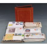 A quantity of loose GB first day covers including early QEII and a Benham album