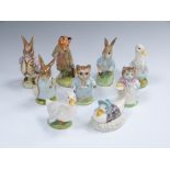 Nine Beswick Beatrix Potter figures including Flopsy Bunny, Benjamin Bunny, Mr Tod, Mrs Ribby, Tom