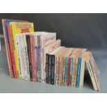 Thirty-three humorous and cartoon comic books including The Perishers, Peanut, Calvin and Hobbs etc.