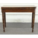19thC cross banded mahogany fold over games table raised on turned tapering legs, H69 x W91 x D45cm