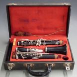 Rosewood clarinet, stamped 'foreign' no5383, with nickel mounts and keys, in original fitted case