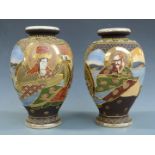 A pair of Japanese Satsuma vases with gilt and figural decoration, H29cm