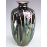 A late 19th/20thC Chinese cloisonné pedestal vase decorated with irises, H30cm