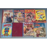 Eight annuals and comic books including Superman, Superboy, Film Fun, Buffalo Bill, The Ace Book