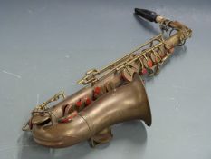 Brass alto saxophone stamped with no 85 to valve lever