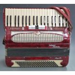 Selmer Invicta 'Rapallo' 120 bass piano accordion in red pearloid finish, with five treble