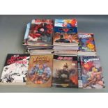 Forty-six comic and similar books including Marvel The Ultimate Graphic Novels Collection, DC The