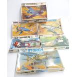 Six Hasegawa 1:32 scale model aeroplane kits including Curtiss BF 2C-1, Mitsubishi Type-Zero Zeke,