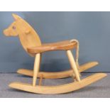 Crowdies of Carterton elm rocking horse with platted rope tail, 90cm long.