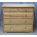 A contemporary light oak chest of two over three graduated drawers, W89 x D44 x H75cm