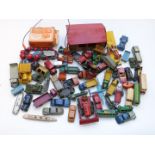 A collection of over sixty Dinky diecast vehicles and tin storage shed, including Blaw Knox