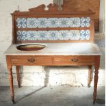 A pine washstand with marble top and tile back, W123 x D53 x H75cm