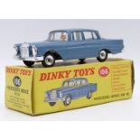 Dinky Toys Mercedes Benz 220 SE diecast model with blue body, white interior and silver hubs, 186,