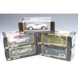 Five Maisto Special Edition 1:18 scale diecast model cars comprising Porsche 911 Carrera