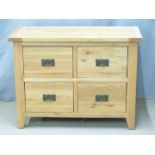 A contemporary light oak chest of four drawers, W100 x D40 x H76cm