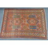 Turkoman rug with wine ground, 220 x 170cm