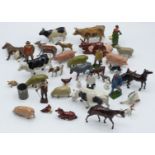 Over 40 Britains and similar lead model farm animals, figures and accessories.