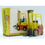 Dinky Toys diecast model Conveyancer Fork Lift Truck with yellow and orange body and yellow hubs,