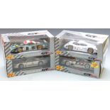 Four Maisto GT Racing 1:18 scale diecast model cars comprising two Porsche 911 GT1 and Mercedes