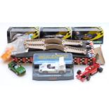 Six Scalextric model motor racing cars including James Bond Formula 1 etc, four in original boxes,