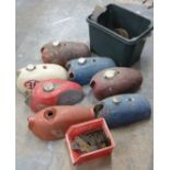 Seven motorbike petrol tanks and engine plates