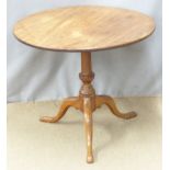 A 19thC mahogany circular tilt top table raised on triform base, H75 x diameter 79cm