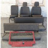 Land Rover Defender seats and parts comprising two bench seats, three further seats, front panel and