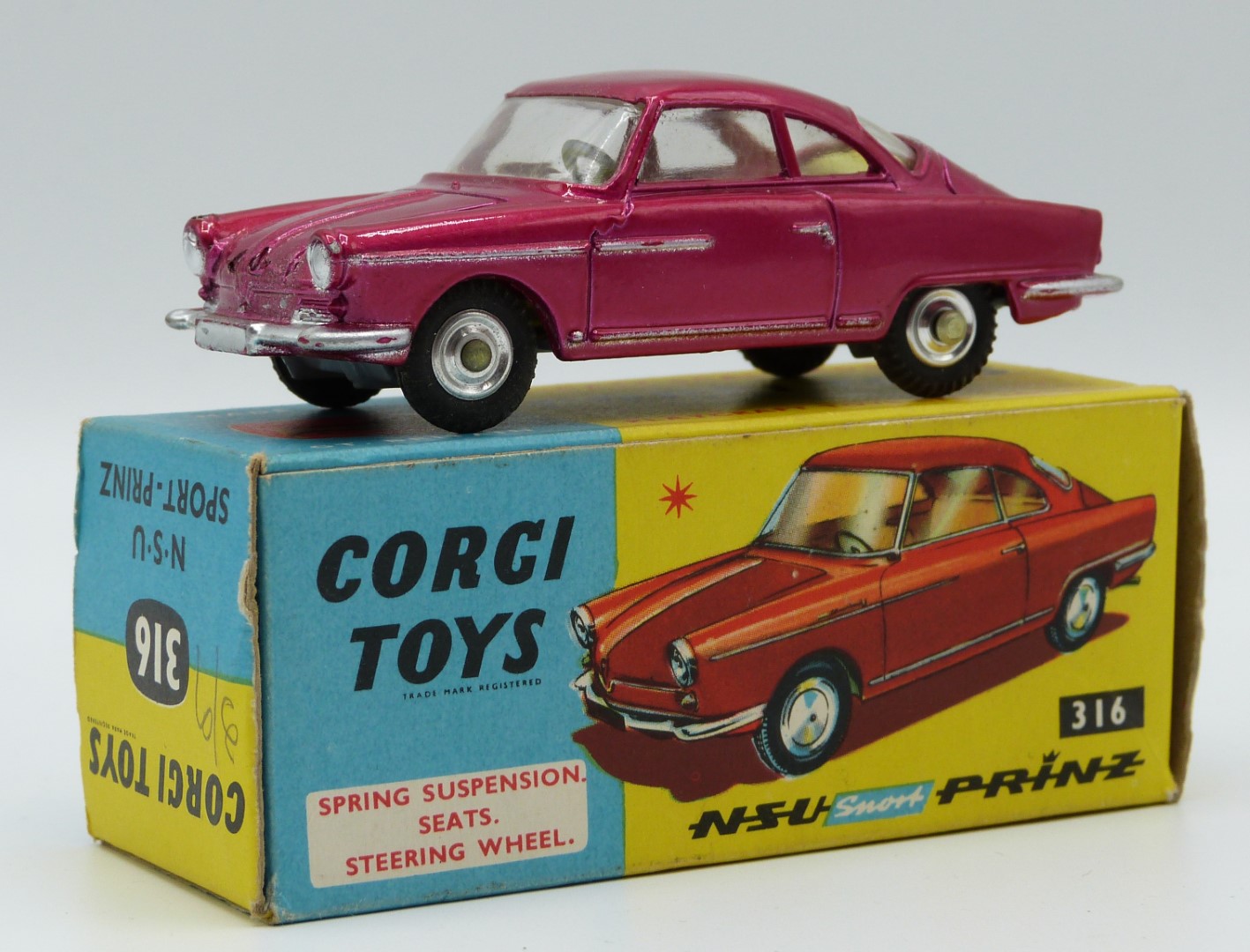 Corgi Toys diecast model NSU Prinz Sport with metallic pink body, cream interior and silver hubs,
