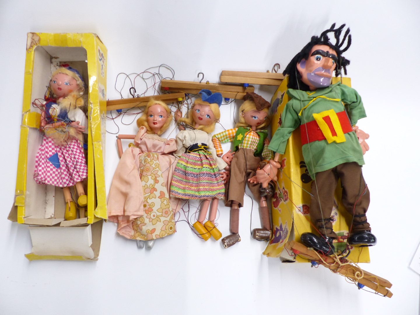 Five Pelham puppets comprising Giant, Cinderella, Dutch Girl and two others, two in original boxes.