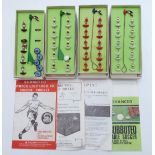 Four Subbuteo table soccer teams Fulham, Plymouth Argyle, Liverpool and Crystal Palace, all in