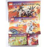 Four Lego Mars Mission construction sets Armoured Drilling Unit 7699, Recon Dropship 7692, Astro