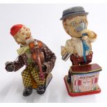 Two battery operated tinplate novelty figures Rosko Toys Charley Weaver Bartender and Alps of