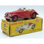 Dinky Toys diecast model M.G. Midget Sports with red body and hubs, beige driver and brown