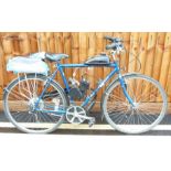 Raleigh bicycle with Shimano gears etc, fitted with a small two stroke engine 10%+VAT buyers premium