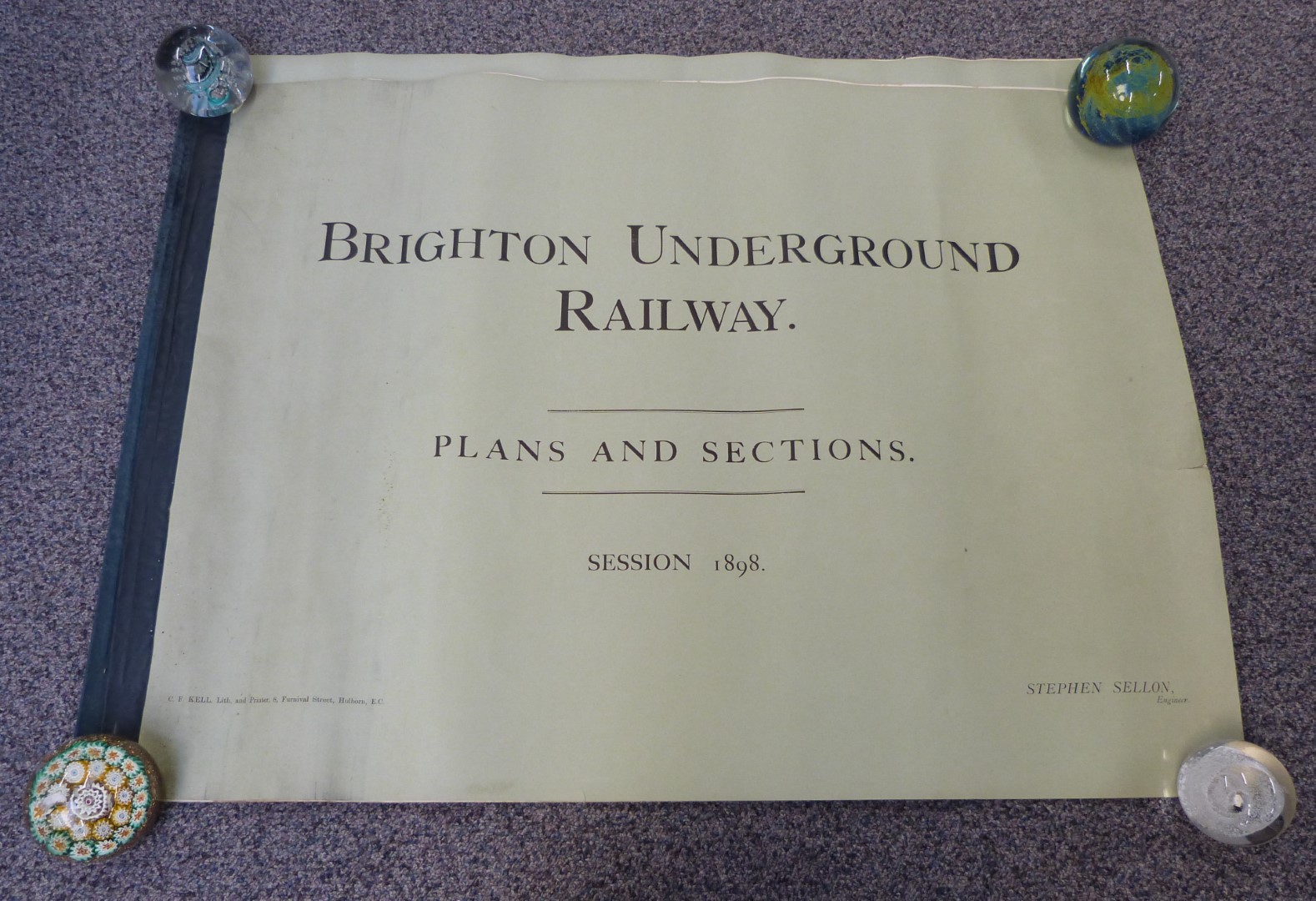 Two bound books of plans and sections relating to the Brighton Underground railway, dated 1898, by