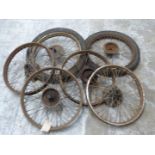 Six vintage or veteran motorbike wheels