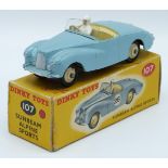 Dinky Toys diecast model Sunbeam Alpine Sports with blue body, white driver, beige interior and