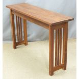 A contemporary hardwood hall table, W122 x D36 x H76cm