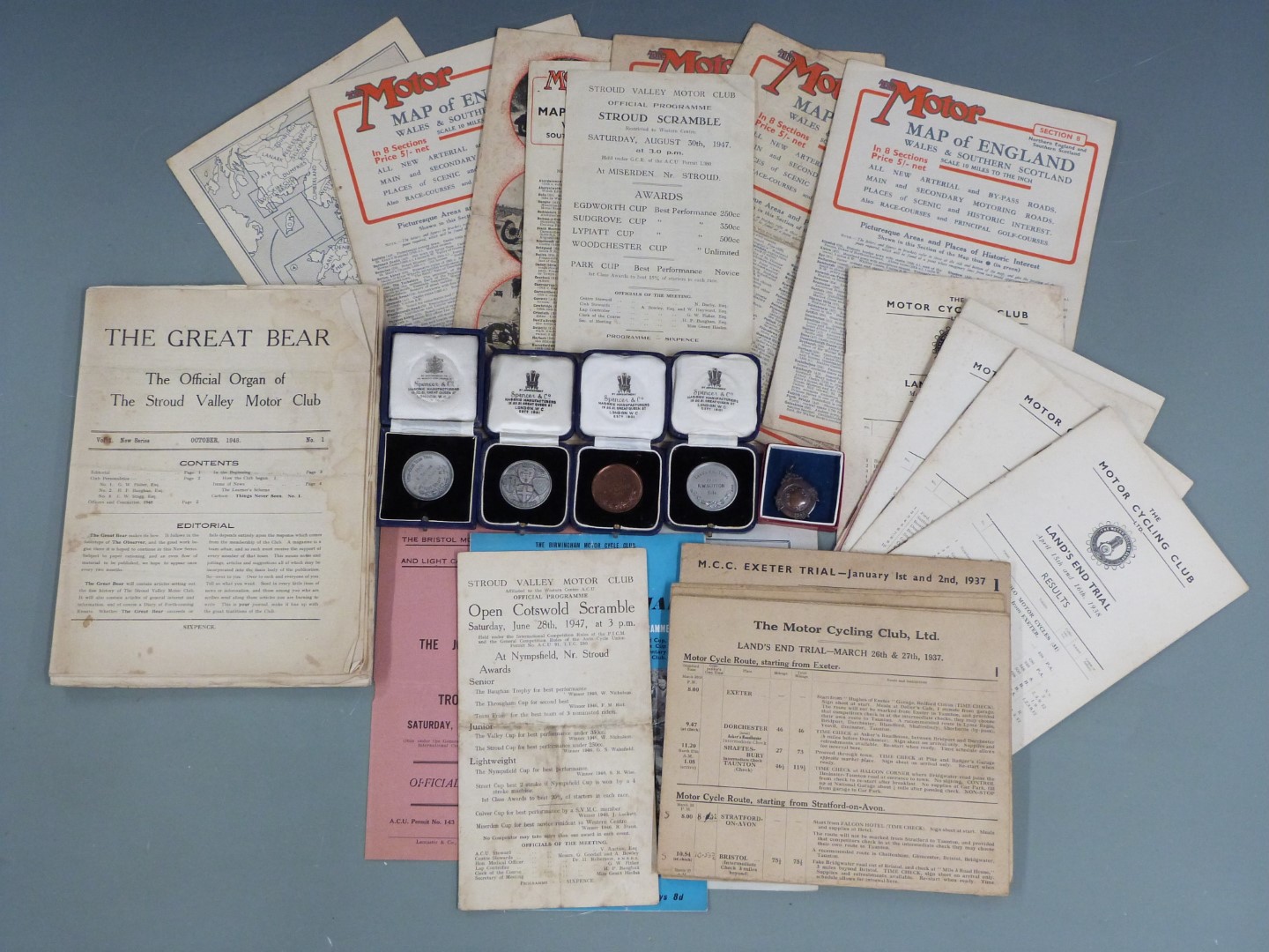 Stroud interest motorcycle trial ephemera and medals relating to R.W. Sutton, including silver