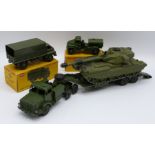 Four Dinky Toys diecast model vehicles comprising Army Covered Wagon 623, Army Water Tanker 643,