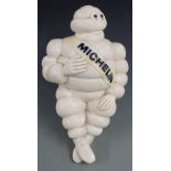 Seated Bibendum Michelin Man advertising display model, on metal mount with Made in France to