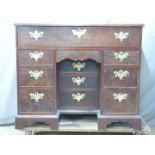 A 19thC mahogany twin pedestal desk, the secretaire style top drawer with fitted interior and