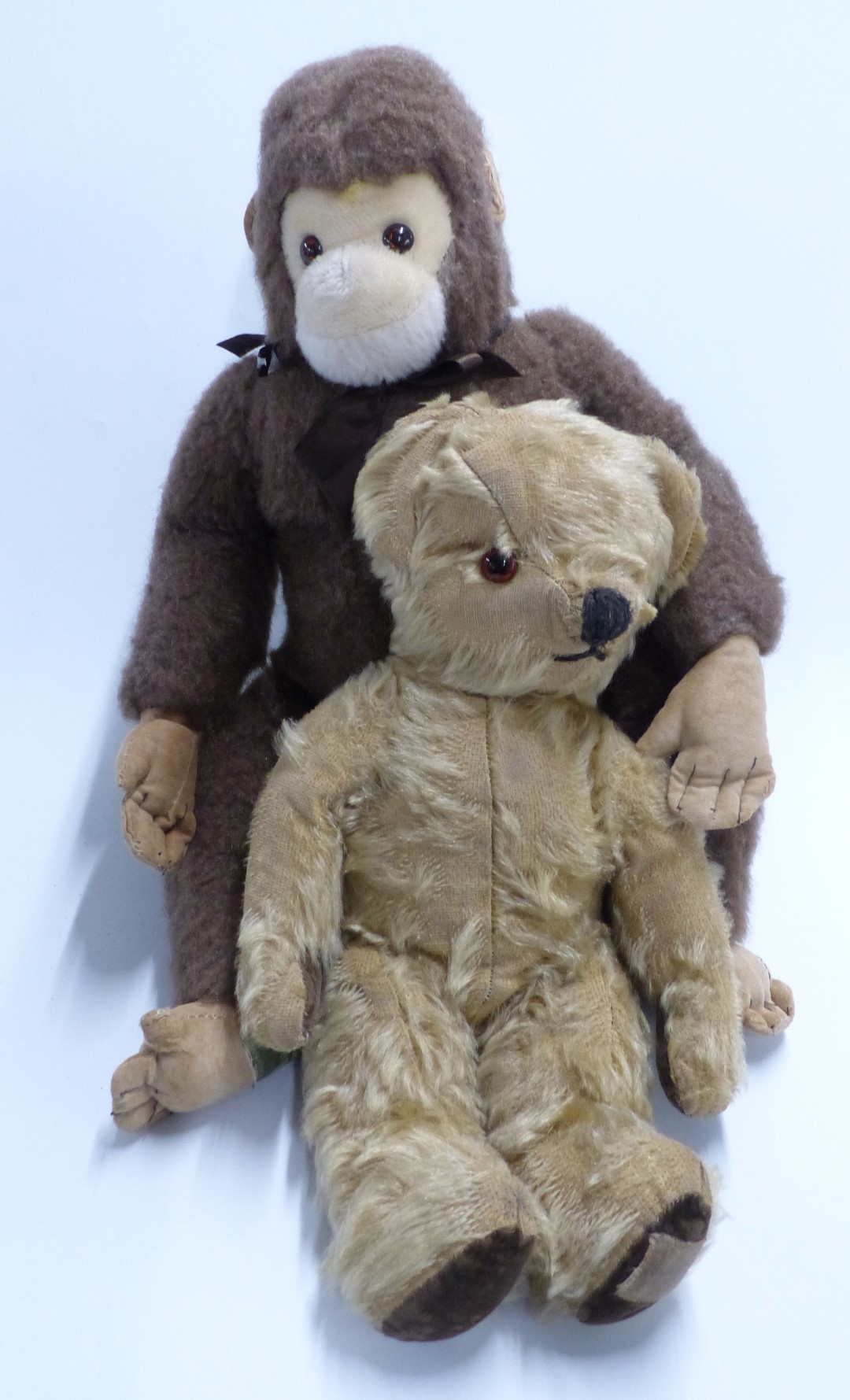 Merrythought for Harrods monkey Teddy bear and a Chad Valley mohair Teddy bear, largest 42cm tall.