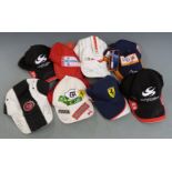 Eight motor racing caps, each signed by a Formula 1 driver including Jensen Button, Felipe Massa,