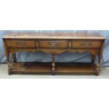 Georgian style oak dresser with three straight drawers, shaped apron and undershelf, W183 x D465 x