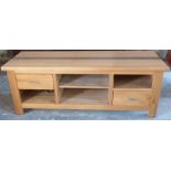 A contemporary light oak low sideboard, W150 x D50 x H60cm